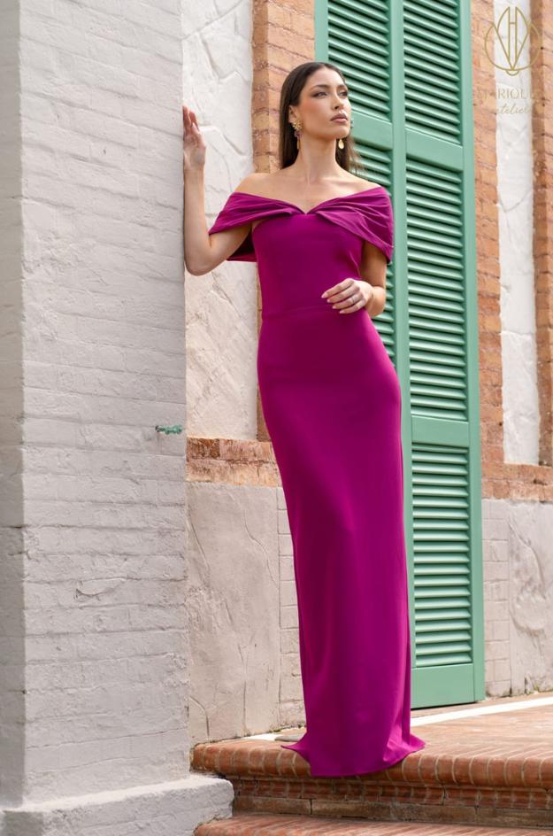 Vestido fucsia invitada escote bardot La Caleta